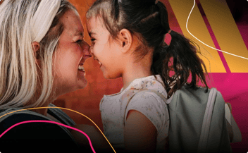 An adult and a young child smile at each other, touching noses. There are wavy lines around their shoulders. The child is wearing a backpack and has a ponytail.