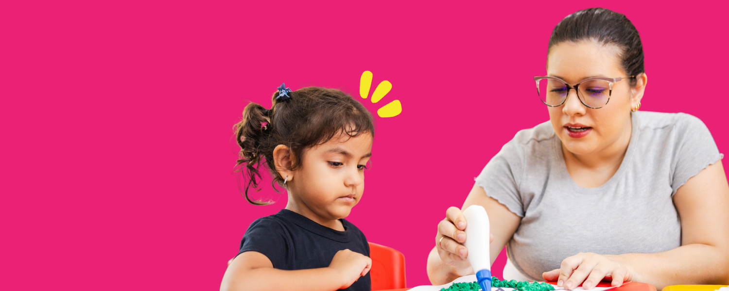 A woman does crafts next to a child